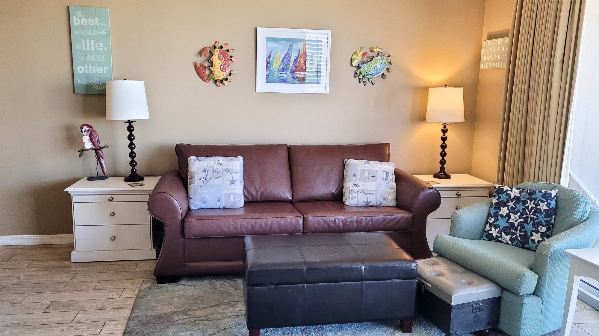 Small living spaces with seating area in beach condo for vacation rental.